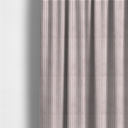 The fabric used to create these made-to-measure curtains is a soft, dusty pink or blush-coloured corduroy featuring a consistent vertical ribbed texture.