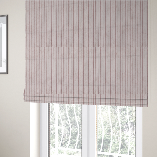 The fabric used to create these Roman blinds is a soft, dusty pink or blush-coloured corduroy featuring a consistent vertical ribbed texture.