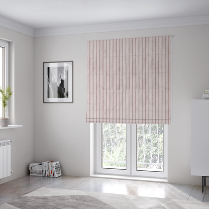 The fabric used to create these Roman blinds is a soft, dusty pink or blush-coloured corduroy featuring a consistent vertical ribbed texture.