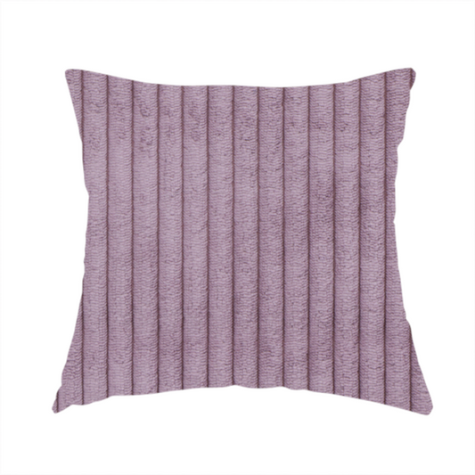 The fabric used to create this handmade cushion is a soft, dusty mauve or lavender-toned corduroy featuring a consistent vertical ribbed texture.