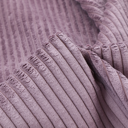 This fabric is a soft, dusty mauve or lavender-toned corduroy featuring a consistent vertical ribbed texture.
