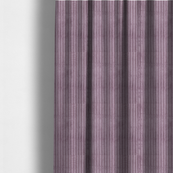 The fabric used to create these made-to-measure curtains is a soft, dusty mauve or lavender-toned corduroy featuring a consistent vertical ribbed texture.
