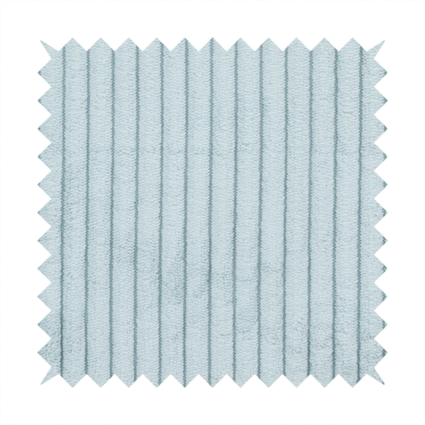 This fabric is a pale, icy blue corduroy featuring a consistent vertical ribbed texture.