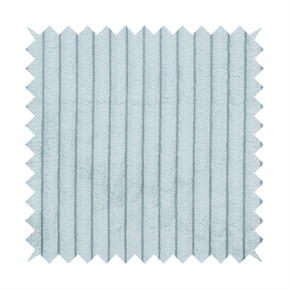 This fabric is a pale, icy blue corduroy featuring a consistent vertical ribbed texture.