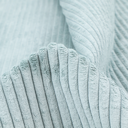 This fabric is a pale, icy blue corduroy featuring a consistent vertical ribbed texture.