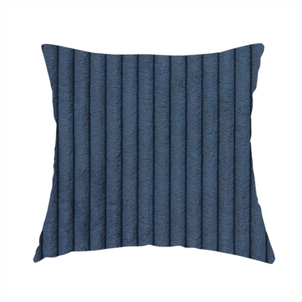 The fabric used to create this handmade cushions is a deep navy blue corduroy featuring a consistent vertical ribbed texture.