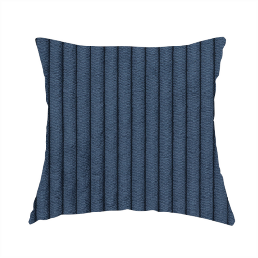 The fabric used to create this handmade cushions is a deep navy blue corduroy featuring a consistent vertical ribbed texture.