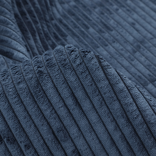 This fabric is a deep navy blue corduroy featuring a consistent vertical ribbed texture.