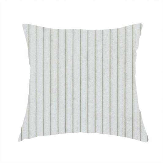The fabric used to create this handmade cushion is a light grey corduroy featuring a consistent vertical ribbed texture.