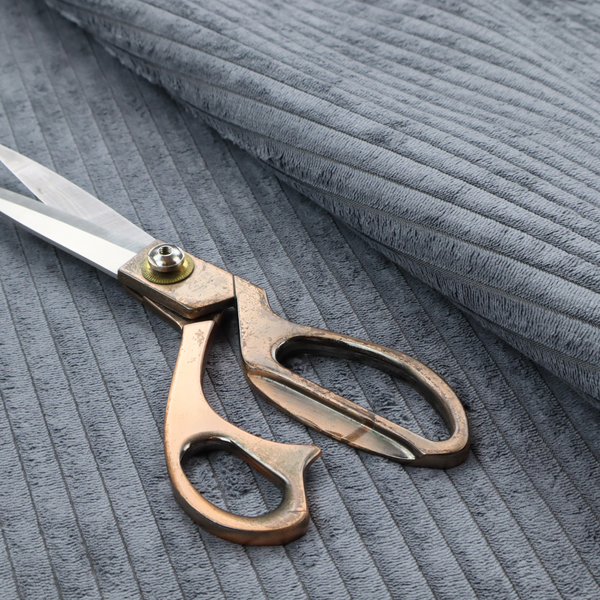 This fabric is a medium-to-dark grey corduroy featuring a consistent vertical ribbed texture.