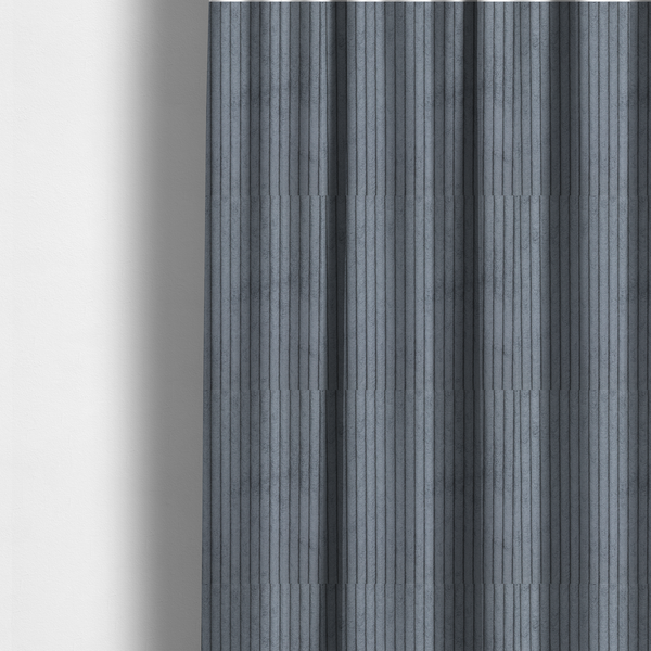 The fabric used to create these made-to-measure curtains is a medium-to-dark grey corduroy featuring a consistent vertical ribbed texture.