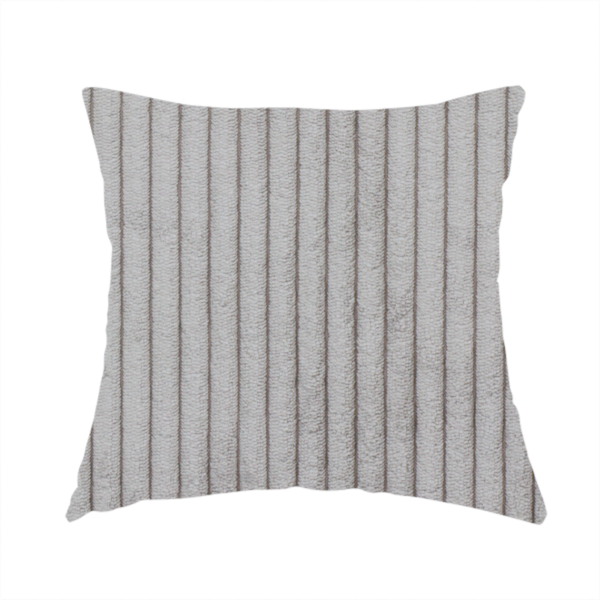 The fabric used to create this handmade cushion is a cool-toned, light grey or silver-grey corduroy featuring a consistent vertical ribbed texture.