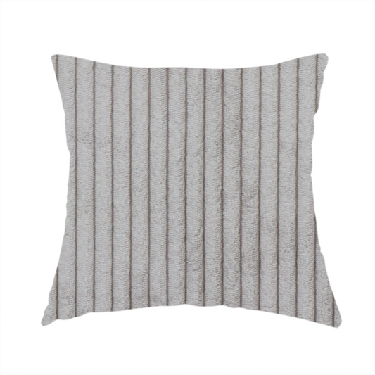 The fabric used to create this handmade cushion is a cool-toned, light grey or silver-grey corduroy featuring a consistent vertical ribbed texture.