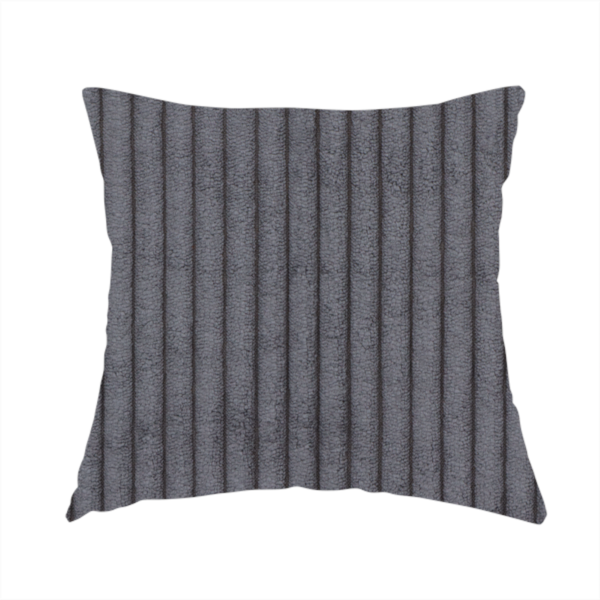 The fabric used to create this handmade cushion is a dark, cool-toned charcoal or slate-grey corduroy featuring a consistent vertical ribbed texture.