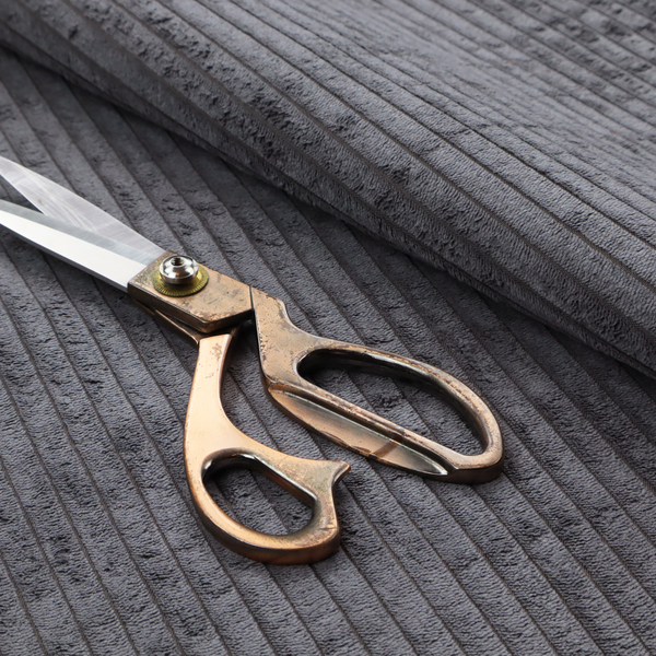 This fabric is a dark, cool-toned charcoal or slate-grey corduroy featuring a consistent vertical ribbed texture.