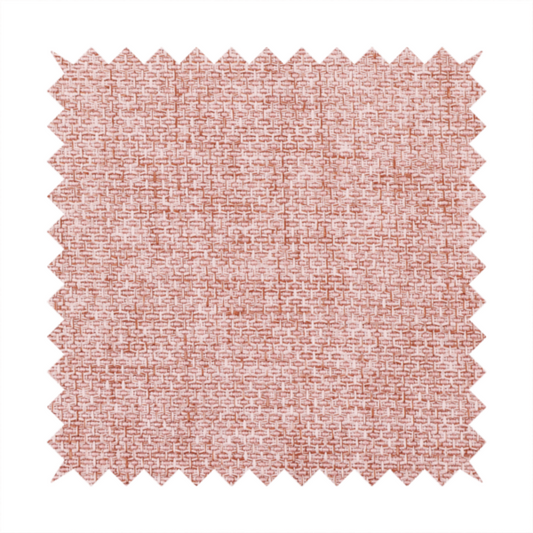 A tightly woven fabric in a dusty rose or muted terracotta colour, featuring a textured basket-weave pattern.