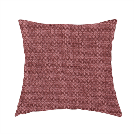 The fabric used to create this handmade cushion is a tightly woven fabric in a deep, muted berry or dusky plum shade, featuring a distinct, structured basket-weave pattern.