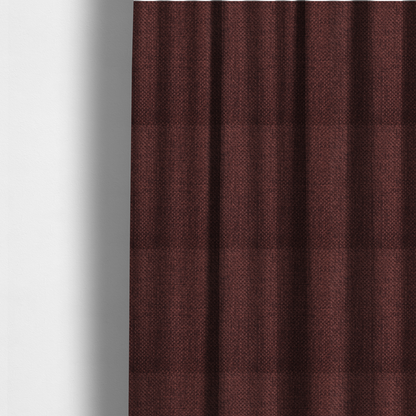 The fabric used to create these made-to-measure curtains is a tightly woven fabric in a deep, rich burgundy or dark maroon shade, featuring a distinct, structured basket-weave pattern.