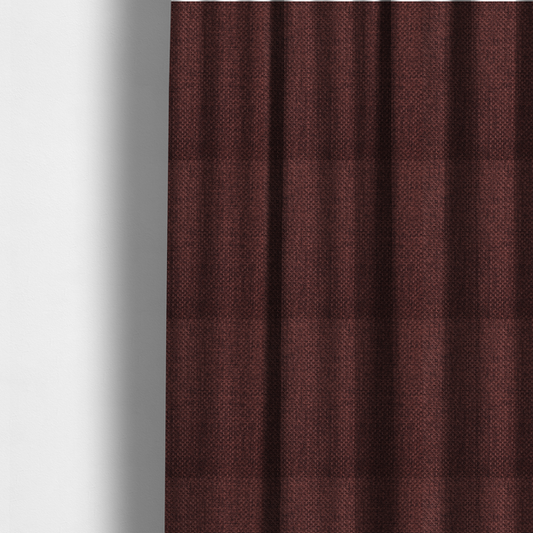 The fabric used to create these made-to-measure curtains is a tightly woven fabric in a deep, rich burgundy or dark maroon shade, featuring a distinct, structured basket-weave pattern.