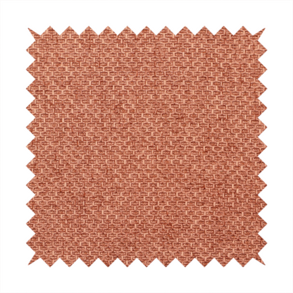 A tightly woven fabric in a warm, muted copper or terracotta shade, featuring a distinct, structured basket-weave pattern.