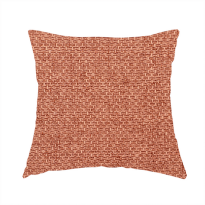 The fabric used to create this handmade cushion is a tightly woven fabric in a warm, muted copper or terracotta shade, featuring a distinct, structured basket-weave pattern.