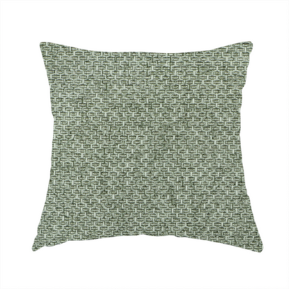The fabric used to create this handmade cushion is a tightly woven fabric in a muted, earthy sage green shade, featuring a distinct, structured basket-weave pattern.
