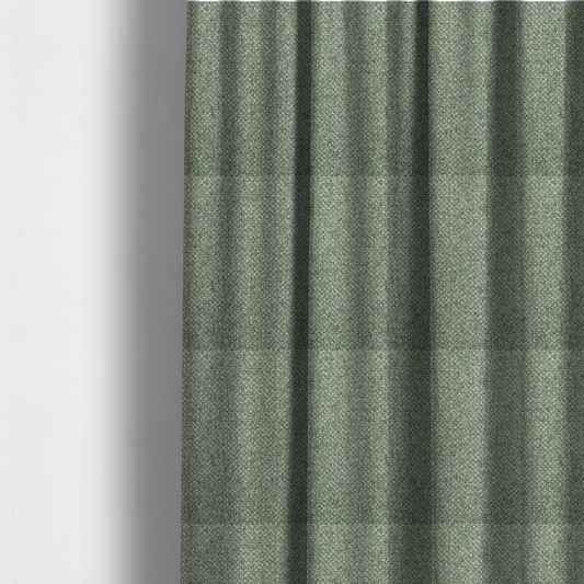 The fabric used to create these made-to-measure curtains is a tightly woven fabric in a muted, earthy sage green shade, featuring a distinct, structured basket-weave pattern.