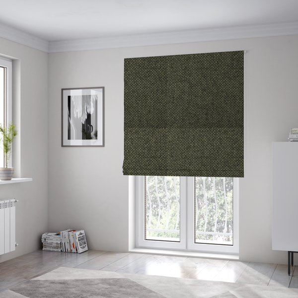 The fabric used to create these Roman blinds is a tightly woven fabric in a deep, sophisticated olive green, featuring a distinct, structured basket-weave pattern.