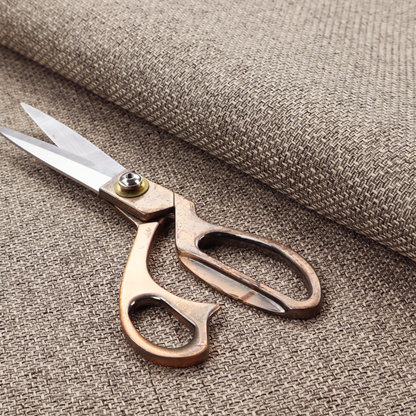 A tightly woven fabric in a neutral, multi-tonal taupe and beige blend, featuring a distinct, structured basket-weave pattern.