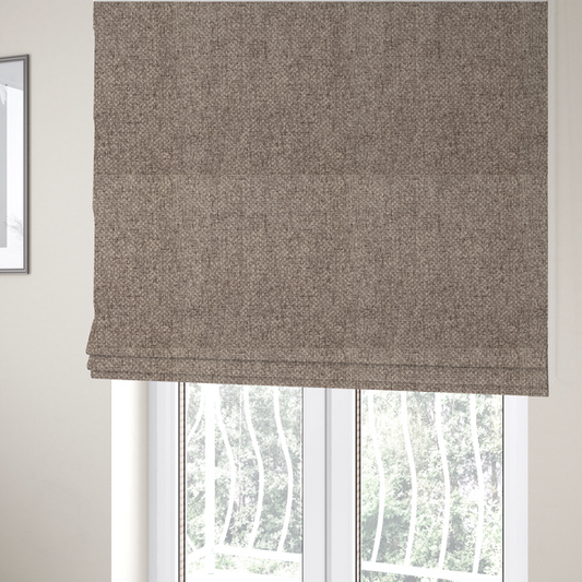 The fabric used to create these Roman blinds is a tightly woven fabric in a neutral, multi-tonal taupe and beige blend, featuring a distinct, structured basket-weave pattern