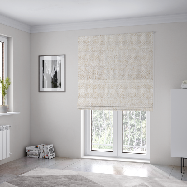 The fabric used to create these Roman blinds is a tightly woven fabric in a clean, bright off-white or light ivory shade, featuring a distinct, structured basket-weave pattern.