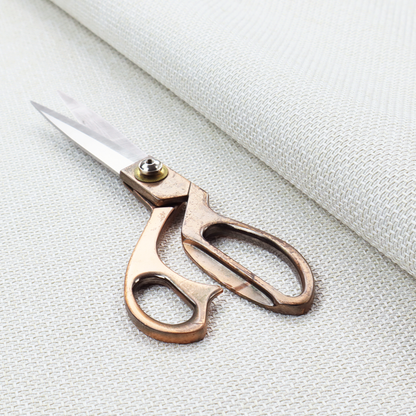 A tightly woven fabric in a clean, crisp off-white or light cream shade, featuring a distinct, structured basket-weave pattern.