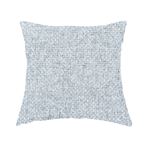 The fabric used to create these handmade cushions is a tightly woven fabric in a soft, cool-toned sky blue and white blend, featuring a distinct, structured basket-weave pattern.