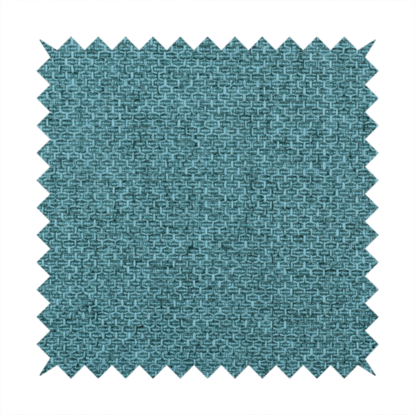 A tightly woven fabric in a deep, cool-toned teal or seafoam blue, featuring a distinct, structured basket-weave pattern.