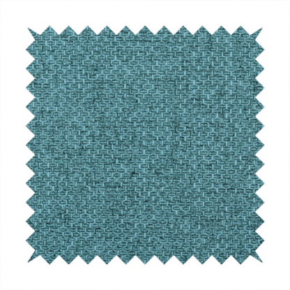 A tightly woven fabric in a deep, cool-toned teal or seafoam blue, featuring a distinct, structured basket-weave pattern.