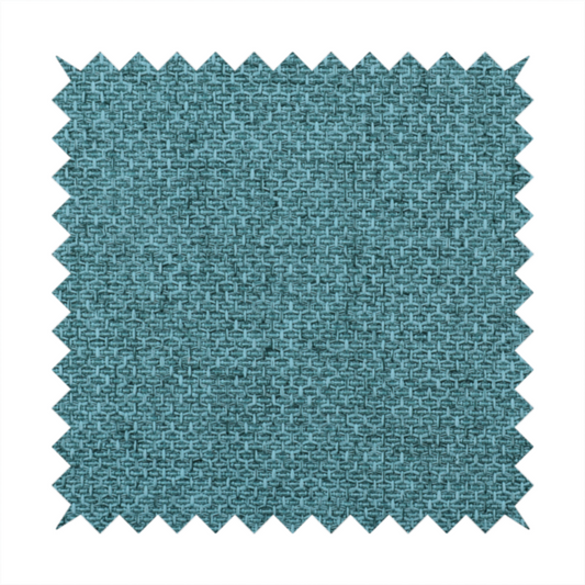 A tightly woven fabric in a deep, cool-toned teal or seafoam blue, featuring a distinct, structured basket-weave pattern.