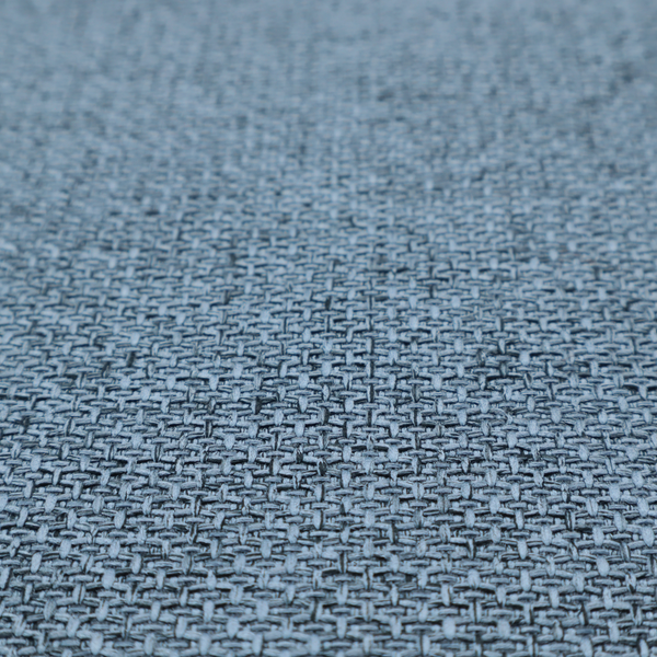 A tightly woven fabric in a cool, muted slate blue, featuring a distinct, structured basket-weave pattern.
