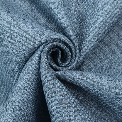 A tightly woven fabric in a cool, muted slate blue, featuring a distinct, structured basket-weave pattern.