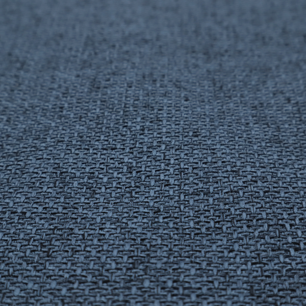 A tightly woven fabric in a deep, sophisticated navy blue, featuring a distinct, structured basket-weave pattern.