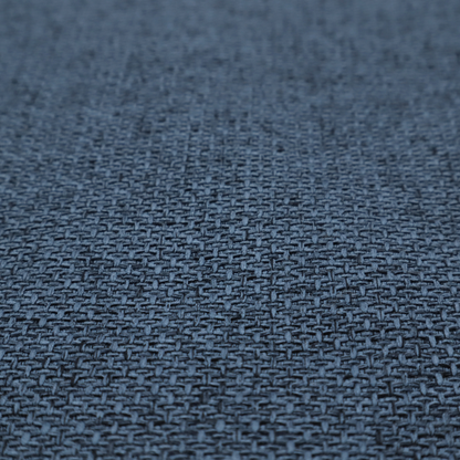 A tightly woven fabric in a deep, sophisticated navy blue, featuring a distinct, structured basket-weave pattern.