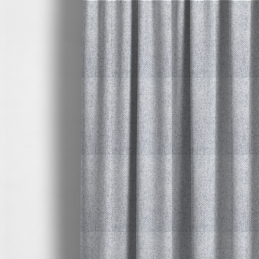The fabric used to create these made-to-measure curtains is a tightly woven fabric featuring a blend of white and cool-toned grey threads, creating a soft, light heathered effect with a distinct, structured basket-weave pattern.