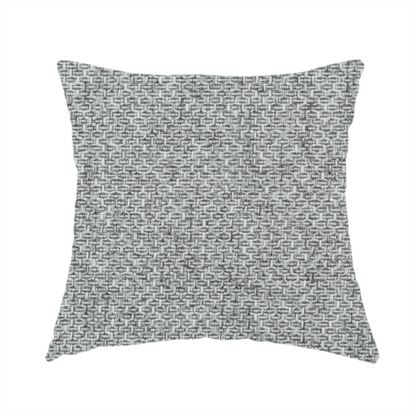 The fabric used to create this handmade cushion is a tight, woven texture with a neutral, monochromatic colour palette. The surface consists of a blend of light grey, charcoal, and white yarns interlocked in a repeating, small-scale geometric pattern.