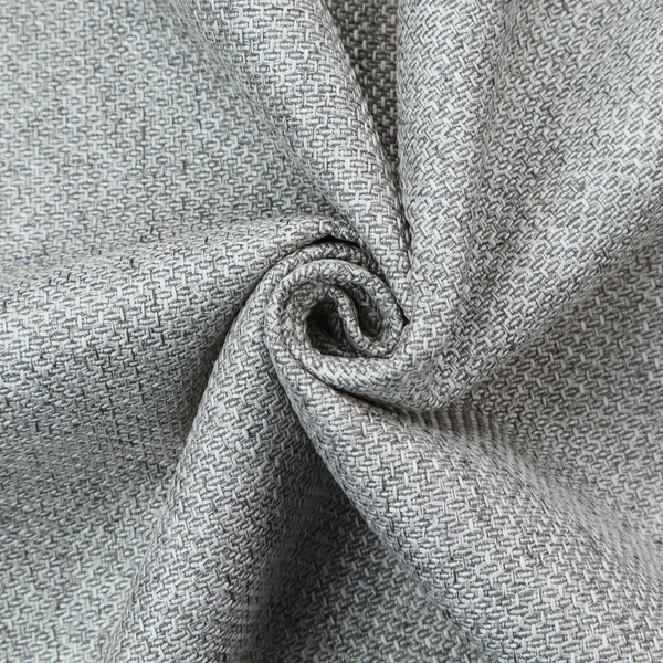 A tight, woven texture with a neutral, monochromatic colour palette. The surface consists of a blend of light grey, charcoal, and white yarns interlocked in a repeating, small-scale geometric pattern.