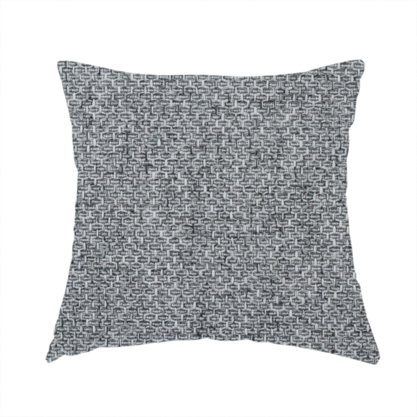 The fabric used to create this handmade cushion is a durable, woven upholstery fabric featuring a monochromatic, heathered grey colour scheme. The weave is tight and consistent, characterized by an intricate, interlocking pattern of light, medium, and dark grey yarns that create a subtle, textured visual effect.