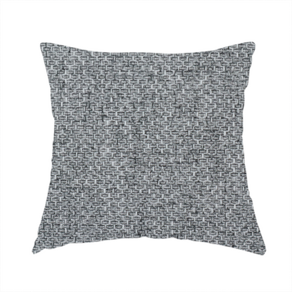 The fabric used to create this handmade cushion is a durable, woven upholstery fabric featuring a monochromatic, heathered grey colour scheme. The weave is tight and consistent, characterized by an intricate, interlocking pattern of light, medium, and dark grey yarns that create a subtle, textured visual effect.