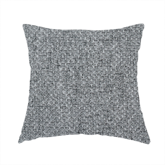 The fabric used to create this handmade cushion is a durable, woven upholstery fabric featuring a monochromatic, heathered grey colour scheme. The weave is tight and consistent, characterized by an intricate, interlocking pattern of light, medium, and dark grey yarns that create a subtle, textured visual effect.