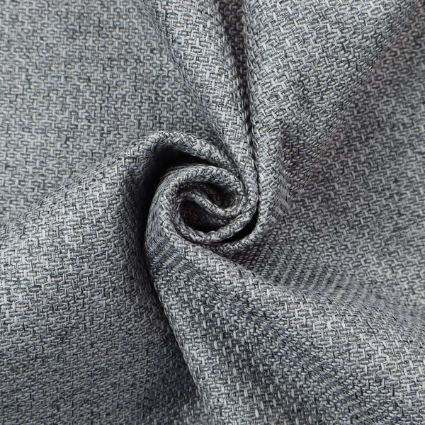 A durable, woven upholstery fabric featuring a monochromatic, heathered grey colour scheme. The weave is tight and consistent, characterized by an intricate, interlocking pattern of light, medium, and dark grey yarns that create a subtle, textured visual effect.
