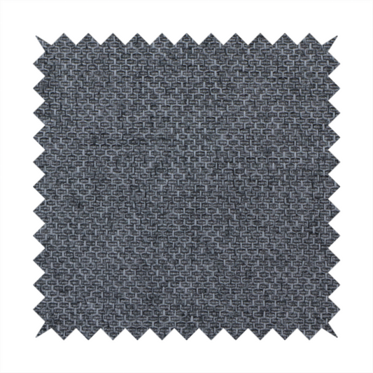 A sturdy, woven upholstery fabric in a deep, sophisticated charcoal grey. Like the previous samples, it features a tight, consistent weave with an interlocking geometric pattern.