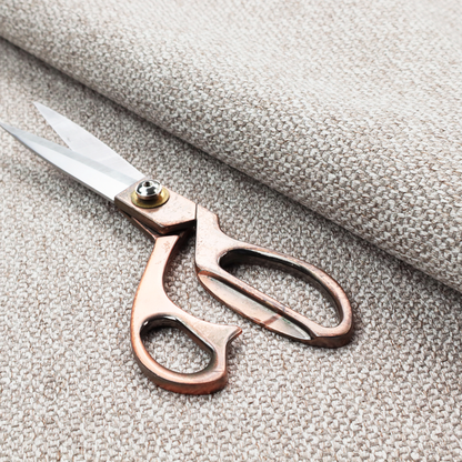 A multi-tonal, textured basket weave in a sophisticated blend of beige, taupe, and off-white yarns.