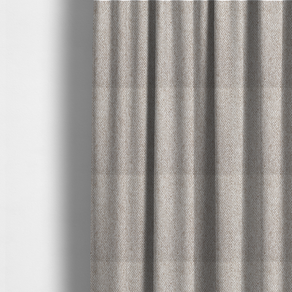 The fabric used to create these made-to-measure curtains is a multi-tonal, textured basket weave in a sophisticated blend of beige, taupe, and off-white yarns.